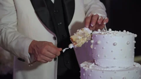 Bride And Groom Serving Cake, Intimate Couple Sharing Beautifully Decorated Stock Footage 323771883