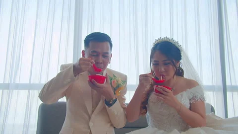 Bride and Groom Sharing Soup Together in Romantic Wedding Moment Stock Footage 333375219