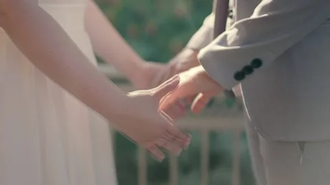 Bride and groom stand facing each other Stock Footage 221026654
