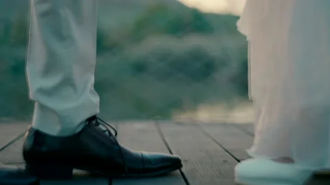 The bride and groom stood opposite each other on the bridge . Stock-Footage 223909631