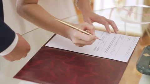 Bride and groom undersign close-up Stock Footage 73289558