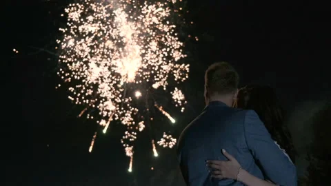 Bride and groom watching fireworks backview. Wedding party. Stock Footage
