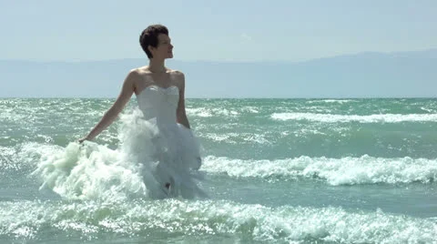 Bride and waves HD Stock Footage 24821155