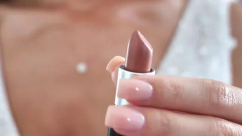 Bride applying lipstick Stock Footage 284507461