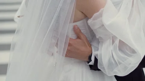 The bride in the arms of the groom. Stock Footage 257618750