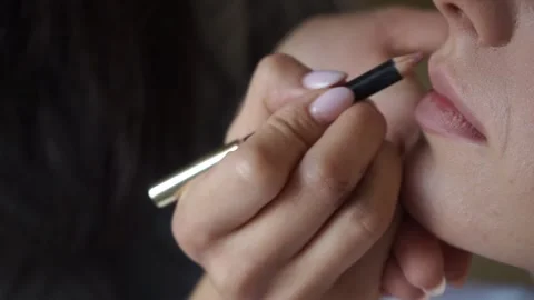 The bride is being made up Stock Footage 163566818