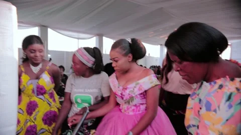 Bride Being Shown Kitchen Gifts at a Traditional Wedding, called Kitchen Party Vídeos de archivo 161060089