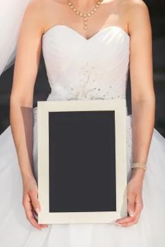 Bride with blank placard Stock Photos