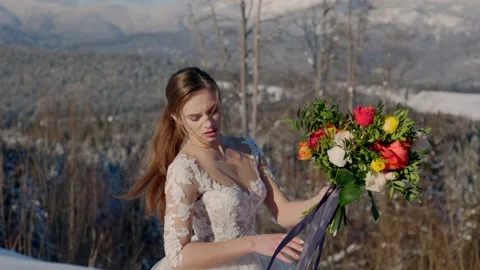 Bride with a bouquet of flowers Video stock 151247224
