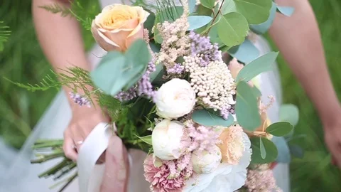 Bride with bouquet in hands Stock Footage 93155195