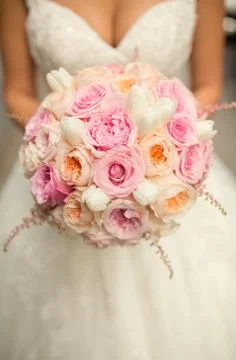 Bride with bouquet in hands.close up Stock Photos