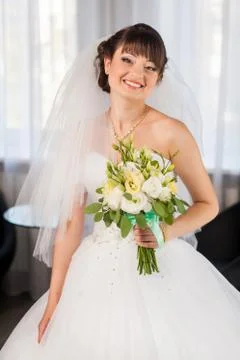 Bride with bouquet Stock Photos