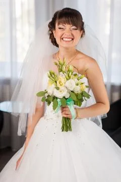 Bride with bouquet Stock Photos