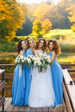 Bride with bridesmaids Stock Photos