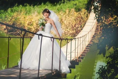 Bride on the bridge Stock Photos