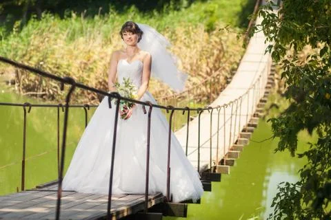 Bride on the bridge Stock Photos
