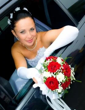 Bride in the car Stock Photos