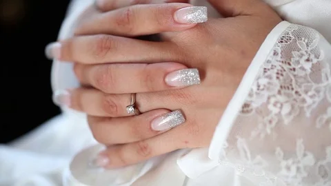 Bride clasped hands Stock Footage 72118149