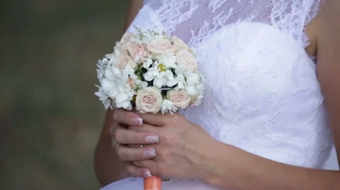 Bride, close-up, bouquet in hand Stock Footage 66303838