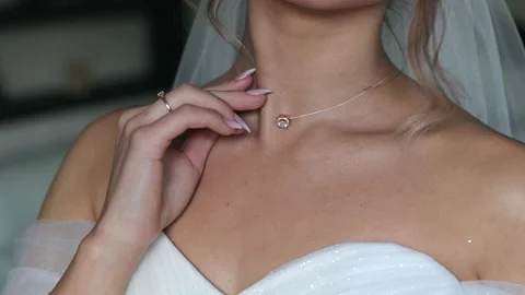 Bride close up hand holding on body. Stock Footage 167606414