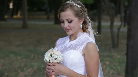 Bride, close-up, sniffing the bouquet Stock Footage 66303847