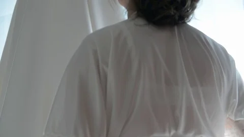 Bride correcting a wedding dress 库存影片 70920674