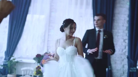 The bride is dancing merrily at the wedding Stock Footage 229102003