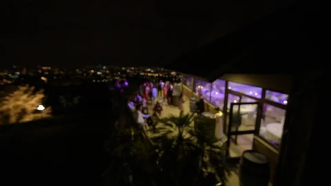 Bride dancing at the party rooftop terrace Stock Footage 95992448