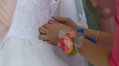 The bride dress knotted strings behind the back Stock Footage 58596595