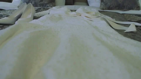 Bride Dress Lying on the Sofa Stock Footage 62771960