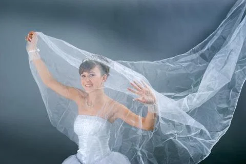 Bride dressed in elegance white wedding dress Stock Photos