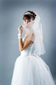 Bride dressed in elegance white wedding dress Stock Photos