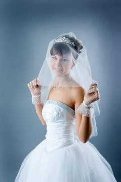 Bride dressed in elegance white wedding dress Stock Photos