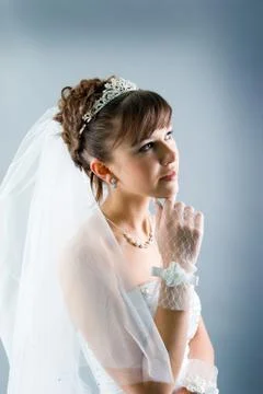 Bride dressed in elegance white wedding dress Stock Photos