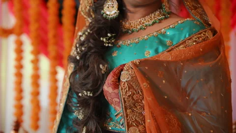 Bride dressed in traditional Indian clothes, Elements of hindu wedding. Close up Stock Footage 281448332