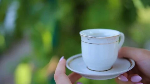 Bride drinking coffee at a wedding day Stock Footage 83399972