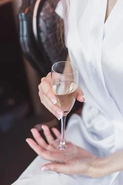 The bride drinks champagne Stock Photos