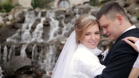 Bride embraces groom's Stock Footage 62431255