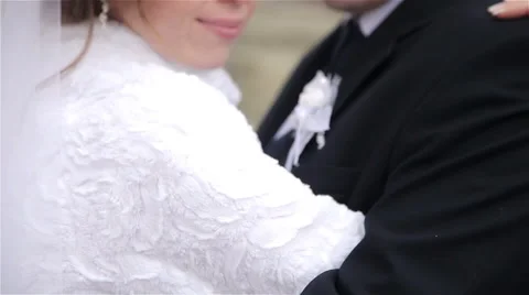 Bride embraces groom's Stock Footage 62431669