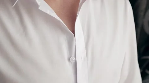 Bride fastens with buttons Stock Footage 58772896