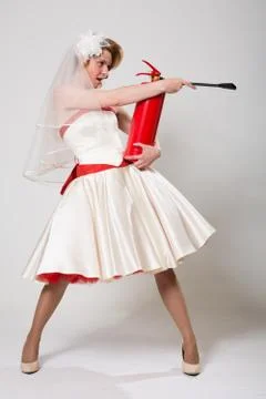 Bride with a fire extinguisher Stock-Fotos