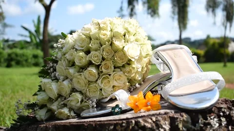 Bride flower bouquet with shoes slider movement with rack focus 50 fps Stock Footage 159642653