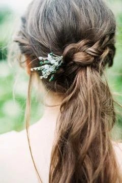 Bride with flowers in the forest Stock Photos