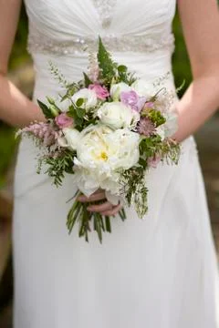 Bride with flowers Stock Photos