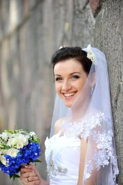 Bride with flowers Stock Photos