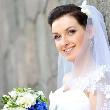 Bride with flowers Stock Photos