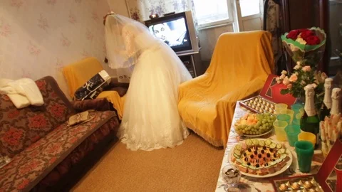 Bride gets ready on wedding day in apartment in Moscow Russia Stock Footage 107632590