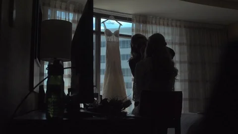 Bride getting Make Up on w/ Dress in BG Stock Footage 87094077