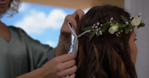 Bride Getting Ready for Wedding Day, Bridesmaid Tying Flower Tiara Stock Footage 103220859