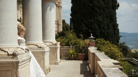 Bride Goes Out To The Balcony. Video stock 104872070